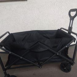 NEW   Not Used.   Baby Wagon  .  Can Folding Wagon $70
