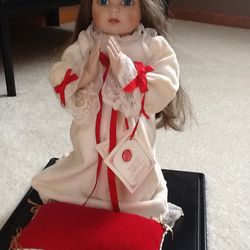 Praying Porcelain Doll