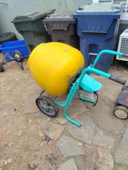 Wellman to portable electric wheelbarrow style cement and mortar mixer
