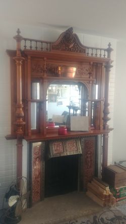 Fireplace carved mantle. Real wood needs a new home i have 2 different styles