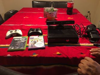 Xbox 360 with two controllers two games and Kinect