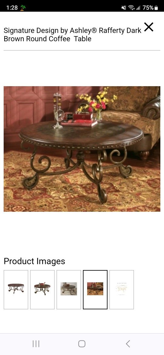 Rafferty Signature Design Brown Round Coffee Table