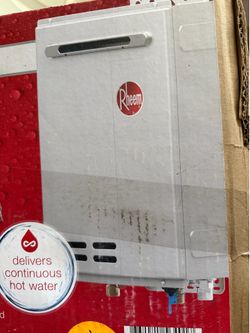 New Rheem 199,000 btu Outdoor Tankless Water Heater GAS