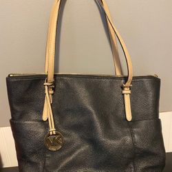 Michael Kors black leather purse With Tan Handles 