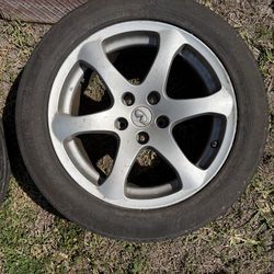 2005 g35 stock rim and tire