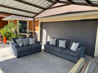 Beautiful seminew two piece sofa set in great condition super nice and comfy asking 600