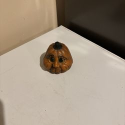 Hand painted ceramic pumpkin face 