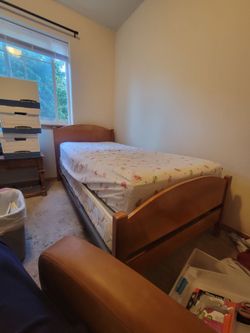 Twin bed with box springs and mattress