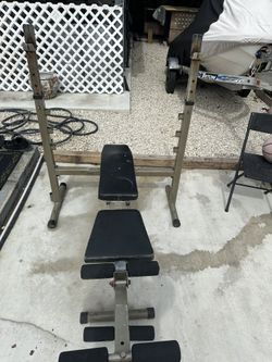 Bench Press Table With A Bar And 2x25 And 2x10