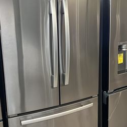 WHIRLPOOL FRENCH STYLE STAINLESS STEEL REFRIGERATOR 