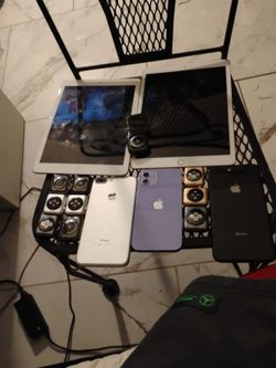 Lot of Apple Devices iPhones iPads Apple Watches