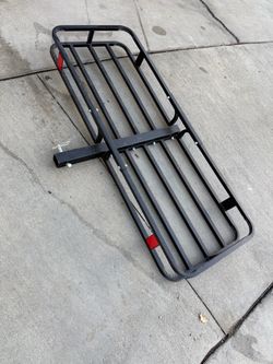 Storage rack for tow hitch