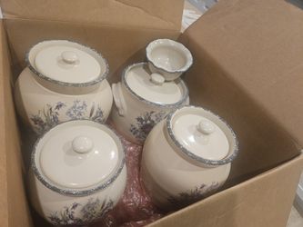 Home & Garden Party Floral stoneware canisters set with lids.