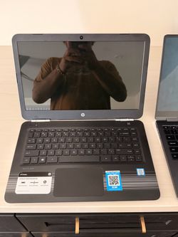 HP Pavilion laptop — black interior, silver exterior