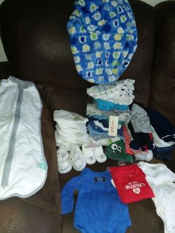 Baby Clothes. Brand New Never Worn. Baby Booties, Onesies, Pants, Swaddlers& Baby Diapers.
