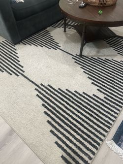 Indoor white rug with black stripes 6’x8’