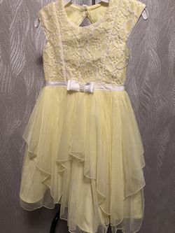 Yellow dress, very pretty. New. Size 8