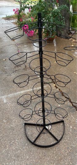 Adorable black metal 15 pot plant holder