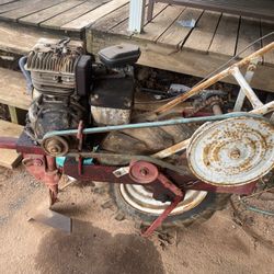 One Wheel Tractor And one for parts