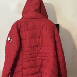 Title: Bold Red Tommy Hilfiger Hooded Puffer Jacket (Size M)  Description: Stay cozy and stylish with this vibrant red puffer jacket from Tommy Hilfig