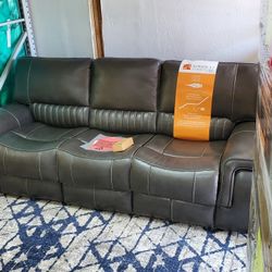 Leather Sofa With Power Recliners And Headrest 