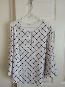 De mujer blanca con negro rayas usada talla L