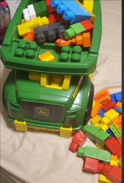 Brand new john deere truck with lots of legos ( never used ).