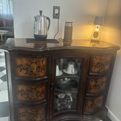 Late 20th Century Wooden Cabinet With Glass Door and Ornate Scrollwork 