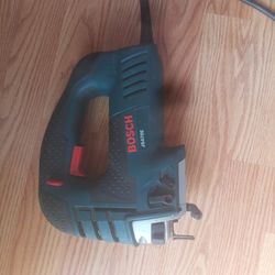 Bosch JS470E top-handle jigsaw.