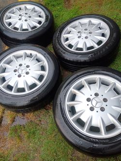 USED Four-16"- OEM-Alloy Mercedes rims and tires 215-55-16