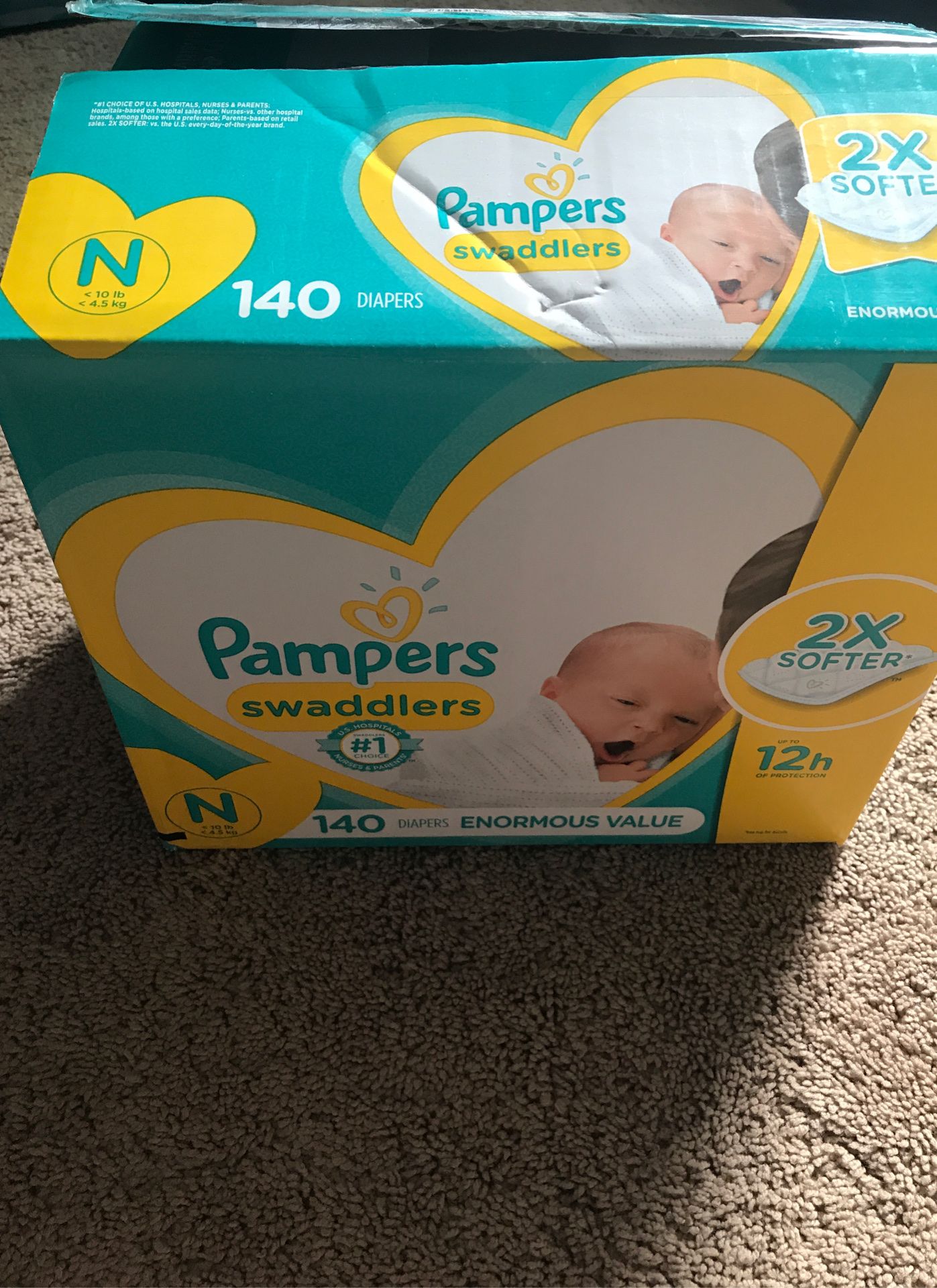 Pampers swaddlers Newborn opened box 129 count