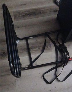 Adjustable swing down bed rail