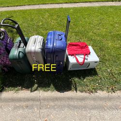 FREE suitcases/luggage/bags and a microwave (may or may not work)
