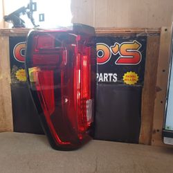 19 25 GMC Sierra 1500 LH Tail Light LED OEM. 