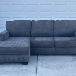 Free Delivery/ Sectional Sofa by Ashley Furniture 