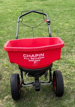 Drop fertilizer spreader