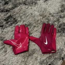 Pink Nike football gloves 