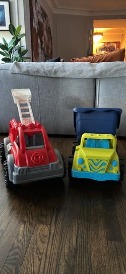Large fire truck and dump truck toys