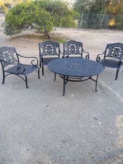 4- Patio Club Chairs and Coffee Table