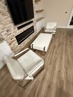 Leather chairs and coffee Table
