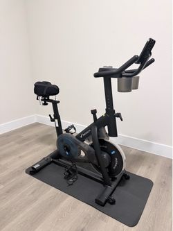 Merach S26 Magnetic Exercise Bike with Dumbbell Rack