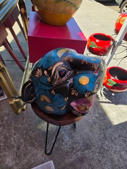Jaguar head carved from wood, handcrafted and hand-painted in the traditional *alebrije* style of Oaxaca, Mexico.
