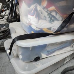 Bins Full Of Football And Baseball Jerceys 