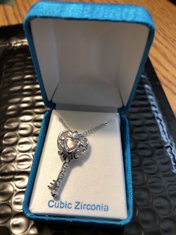 New Key Pink Cubic Zirconia and necklace 18 inches silver tune