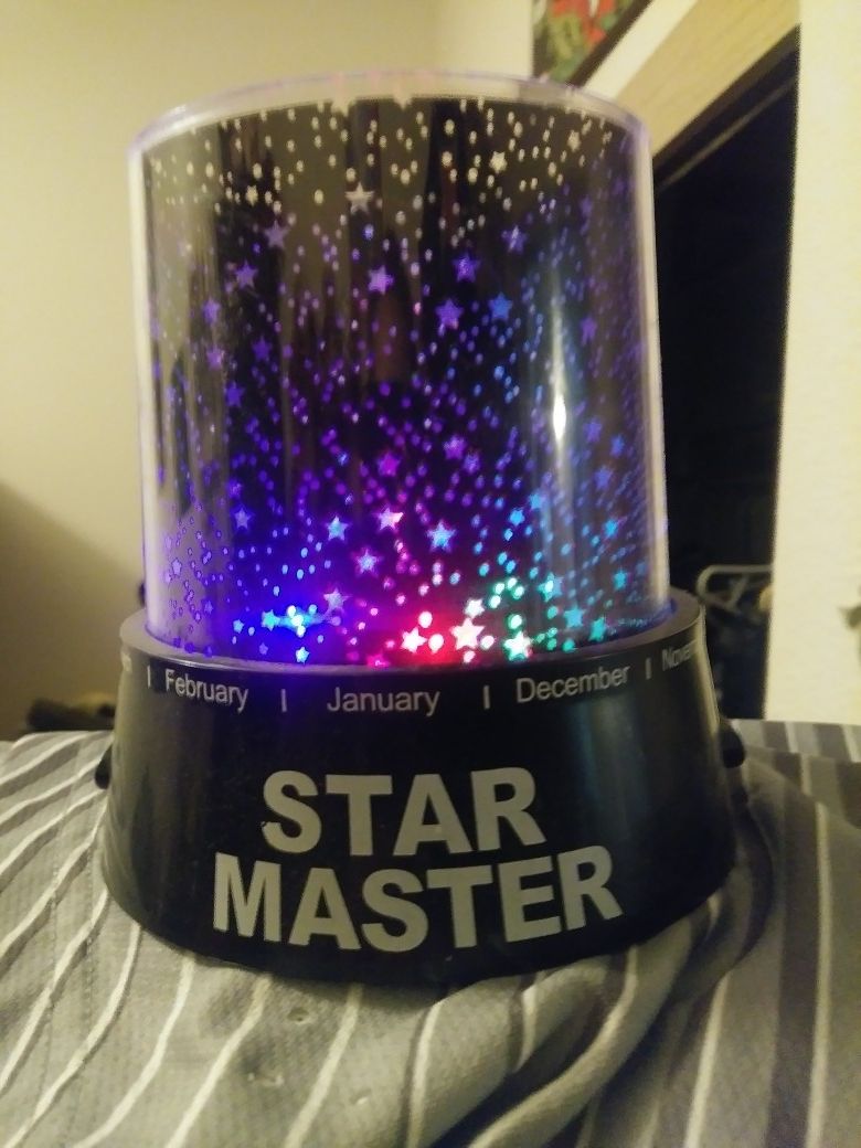 Light projector. Changes color. Or you can choose 1 steady color. Plays music. Super cool 12.00$ no trades!