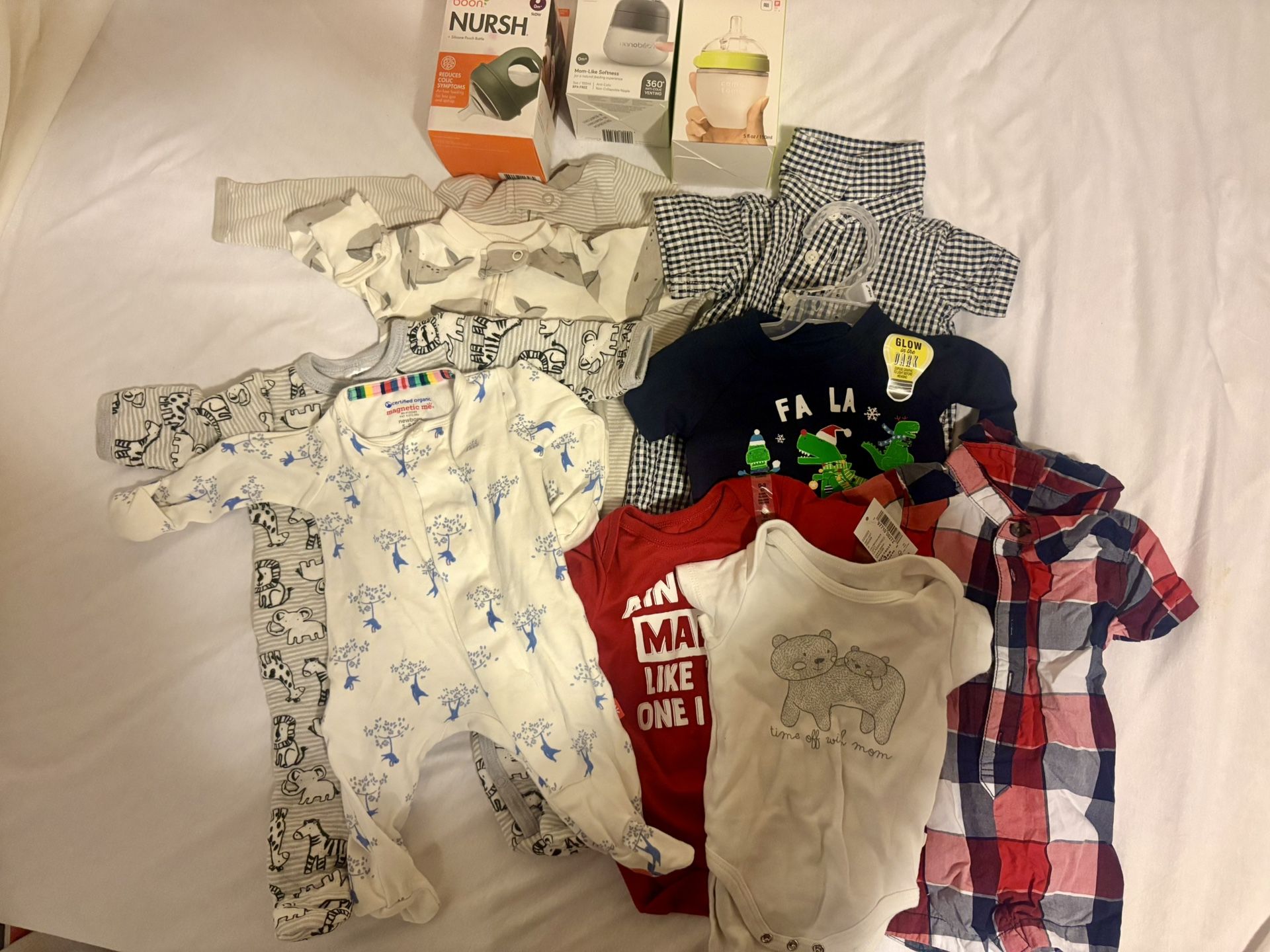 New Baby Bottles And Clothing And Some Clothing Used Once