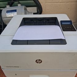 HP LaserJet Pro 400 M404dn Series printer,  Toner Included.