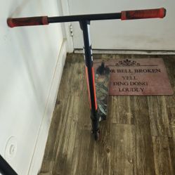 SCOOTER - $50.  Comes With Stand