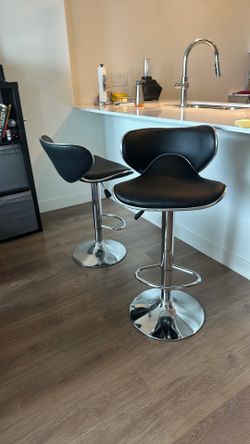 Set of 2 black and silver low back barstools