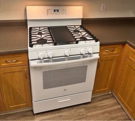 Gas Stove with oven General Electric 30 inches wide with griddle (delivery available)